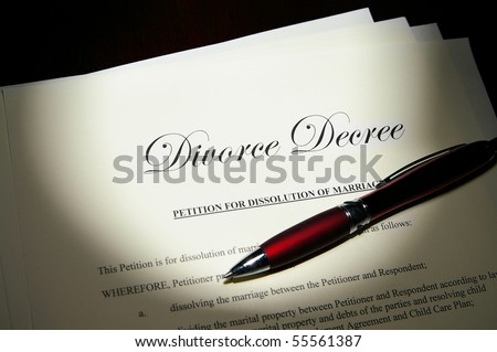 Divorce decree papers and pen