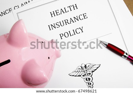 health insurance policy and piggy bank