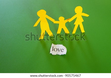 paper cutouts of parents and child