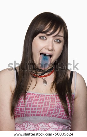 stock photo Portrait of a teen girl sticking out her tongue Her tongue is stock photo Portrait of a teen girl sticking out her tongue Her tongue is