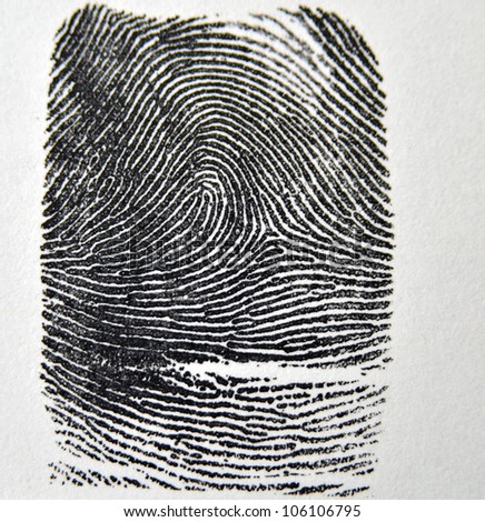 Inked fingerprint rolled onto a state fingerprint card