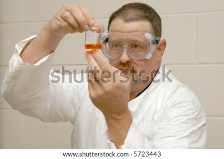 Forensic scientist working on the lab.