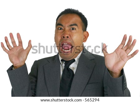 stock photo : Filipino / Asian man in business suit scared and freaking out