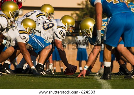 UCLA Bruin Football team on the line of scrimmage