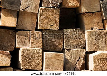 Pile of lumber from the cross section.  Building material at a construction site