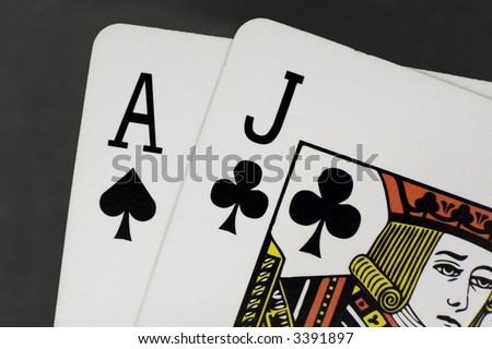 Close up / macro of a pair of cards adding up to 21 or \
