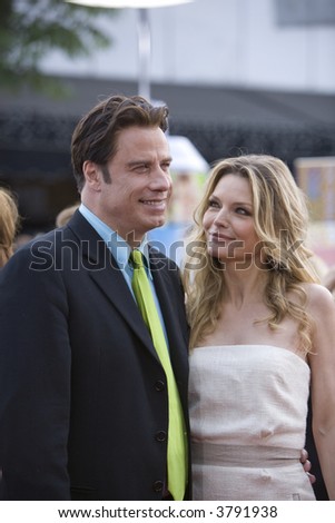 7-10-07 Celebrities John Travolta and Michelle Pfeiffer at the Hairspray Premiere in Westwood