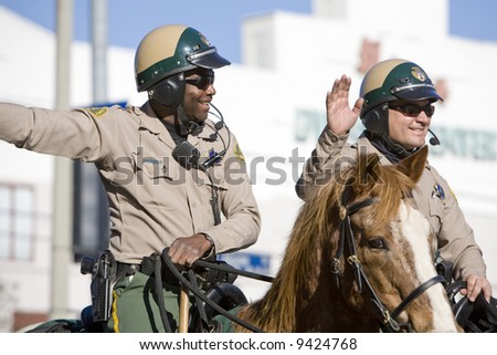 Los Angeles Chinatown, Feb 9th, 2008: Los Angeles Sheriff mounted police in the Chinese New Year parade, celebrating Year of the Rat.
