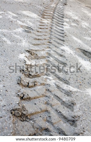 Tire tracks in mud at a construction site