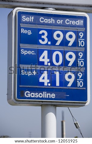 Vertical image of a $4 gas on a Mobil sign.
