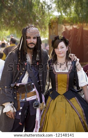 Renaissance Pleasure Faire, Irwindale, CA 4-26-08:  A man dressed as a pirate captain with a lady.