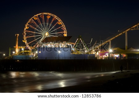Horizontal image of the Pacific Wheel, recently sold at auction, at the Santa Monica Pier amusement park.