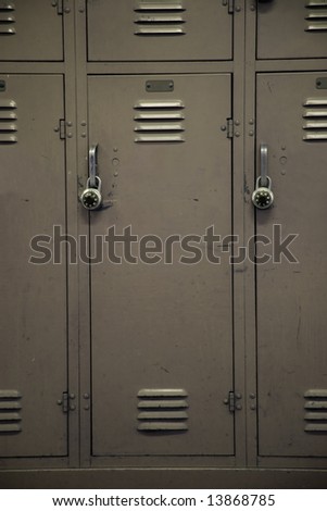 A beige colored school locker, typical of a high school.