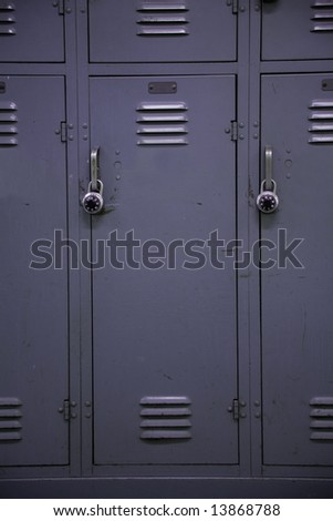 A gray colored school locker, typical of a high school.