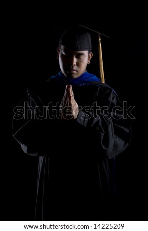 Model in graduation robes and regalia