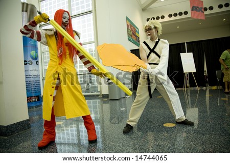 Anime Expo 2008, Los Angeles Convention Center, July 4th, 2008:  Anime fans portraying stylized versions of Ronald McDonald and Colonel Sanders in a battle.