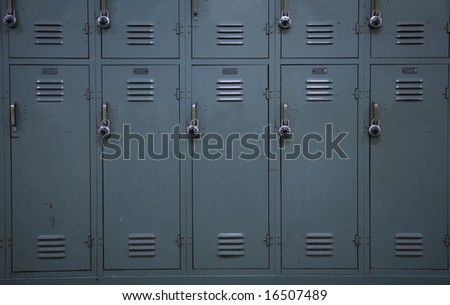 Green colored school lockers, typical of a high school.