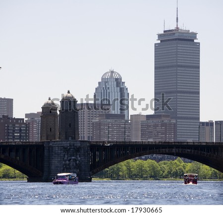 Boston, MA - May 29:  View of the Boston city-scape from the Charles River, with tourist filled Duck tour boats.  Taken May 29th, 2008.