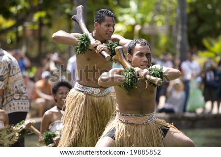 POLYNESIAN CULTURAL CENTER, OAHU, HI - JULY 26:  Students from Fiji perform traditional Fijian dances on a canoe.   Taken at the Rainbows of Paradise Canoe Pageant in 2008.