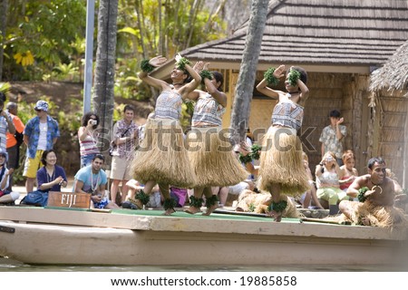 POLYNESIAN CULTURAL CENTER, OAHU, HI - JULY 26:  Students from Fiji perform traditional Fijian dances on a canoe.    Taken at the Rainbows of Paradise Canoe Pageant in 2008.