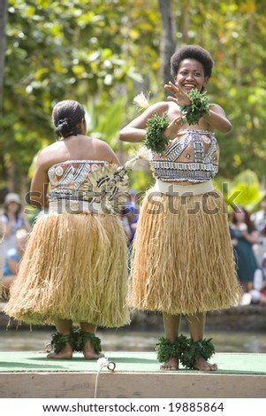 POLYNESIAN CULTURAL CENTER, OAHU, HI - JULY 26:  Students from Fiji perform traditional Fijian dances on a canoe.    Taken at the Rainbows of Paradise Canoe Pageant in 2008.