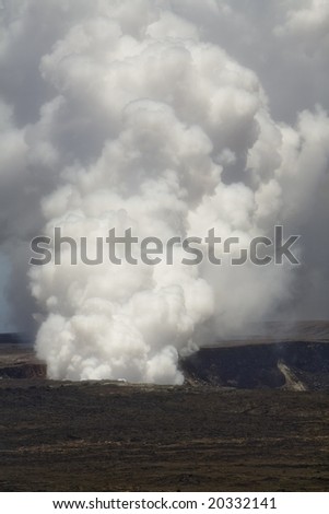 Vertical image of the smoking caldera of the Kilauea volcano on Hawai\'i (Big Island), a shield volcano.