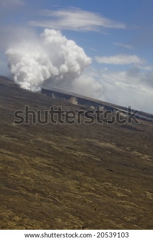 Vertical (tilted) image of the smoking caldera of the Kilauea volcano on Hawai\'i (Big Island), a shield volcano.