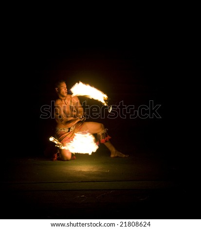 LA'IE, HI - JULY 26: Students performing a fire dance at the Polynesian Cultural Center (PCC) in 2008. The PCC is Hawai'i top paid attraction, and supports BYU students.