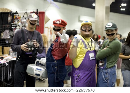 LOS ANGELES - JULY 5: \'Mario\' fans in costume at Anime Expo July 5th, 2008 in Los Angeles. Anime Expo is the nation\'s largest Japanese animation fan convention.