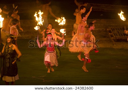 LA\'IE, HAWAII - JULY 26: Students performing a fire dance at the Polynesian Cultural Center (PCC) in 2008. The PCC is Hawaii\'s top paid attraction, and supports BYU students.