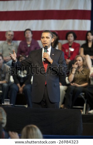 LOS ANGELES - MARCH 19: President Barack Obama listens to questions at a town hall meeting at the Contreras Learning Center on March 19th, 2009 in Los Angeles. 1,100 people attended to hear him speak.