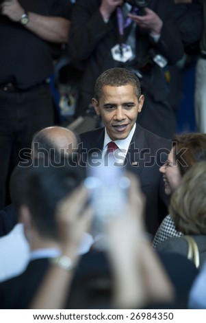 LOS ANGELES - MARCH 19: President Barack Obama greets supporters at the town hall meeting at Contreras Learning Center on March 19th, 2009 in Los Angeles.