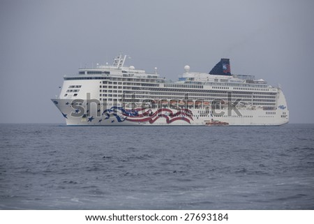 KONA, HI - JULY 23: The Norwegan Cruise Lines ship, \'Pride of America\' docks July 23, 2008 in Kona, Hawaii.  Pride of America is NCL\'s only remaining Hawaii based cruise ship.