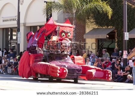 PASADENA, CA - JANUARY 18:  A giant cat float by \'Boo Boo Kitty Camp\' at the Doo Dah Parade on January 18th in Pasadena, CA.  The Doo Dah Parade is a parody of Pasadena\'s more famous Rose Parade.