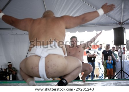 LOS ANGELES - APRIL 5:  Dan Kalbfleisch (R) and Americus Abesamis (L) face off at a Sumo wrestling demonstration at the Little Tokyo Cherry Blossom Festival on April 5, 2009 in Los Angeles.