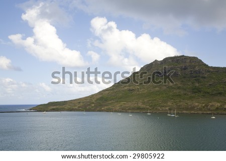 Horizontal image of Hawaii\'s Nawiliwili Harbor in Kauai taken with a wide angle lens.