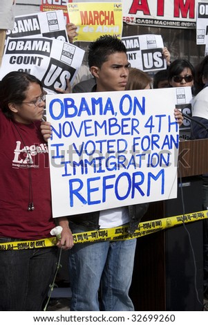 LOS ANGELES - MARCH 19: Immigration rights demonstrators from CHIRLA rally at President Barack Obama\'s town hall meeting in Los Angeles on March 19th, 2009.