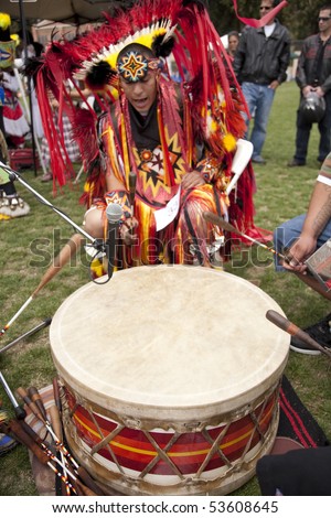 LOS ANGELES - MAY 2: American Indian men drum at the 24th Annual UCLA Pow Wow in Los Angeles on May 2, 2009.