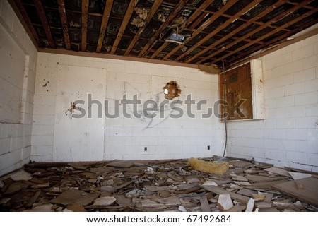 Horizontal image of an abandoned office room with a \