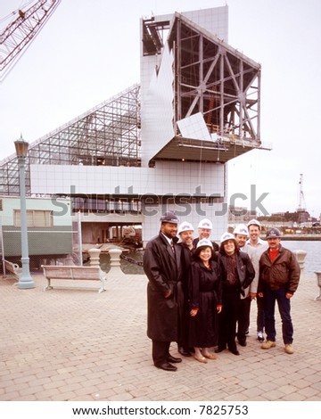 Muscian Jose Feliciano and others at The Rock and Roll Hall of Fame and Museum in Cleveland, Ohio during its construction phase in 1995.
