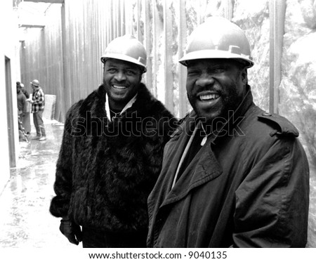 R&B artists Eddie Levert and Walter Williams of The O'Jays tour the Rock and Roll Hall of Fame and Museum in Cleveland, Ohio during its construction phase in 1994.