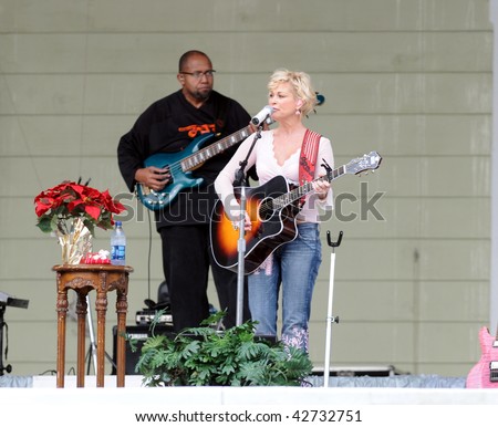 OCALA, FL - DECEMBER 12: Country music star Lorrie Morgan (right) playing live onstage at Silver Springs on December 12, 2009 in Ocala, Florida