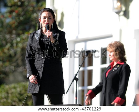 OCALA, FL - JANUARY 2: Country music star Crystal Gayle (left) performs onstage at Silver Springs January 2, 2010 in Ocala, Florida.