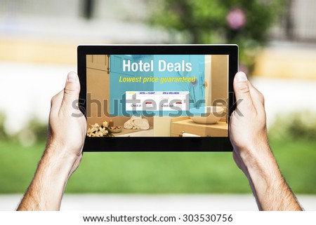 Hotel Deals on tablet. Web template design. Bathroom in the background.
