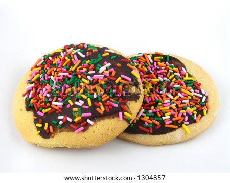 Chocolate covered cookies with rainbow sprinkles