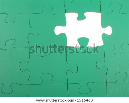 Blank jigsaw puzzle missing one piece
