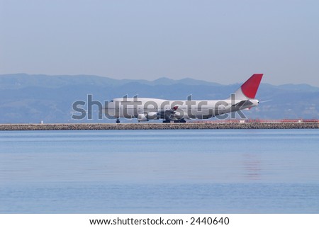 Jumbo jet on the runway at San Francisco International Airport, California