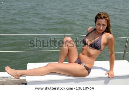 Beautiful brunette in a boat on San Francisco Bay