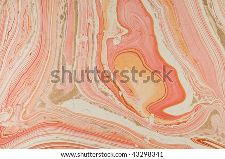 Handmade paper with a swirling marbled pattern