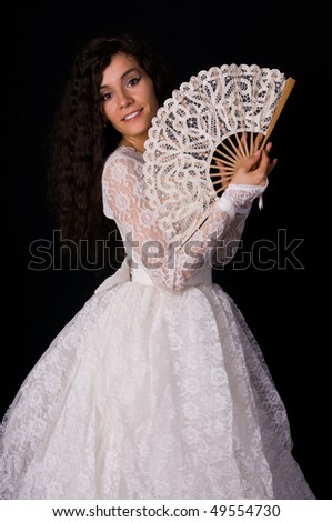 Pretty Colombian woman in a white lace gown